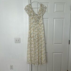 White and yellow floral print dress with ruffled sleeves
